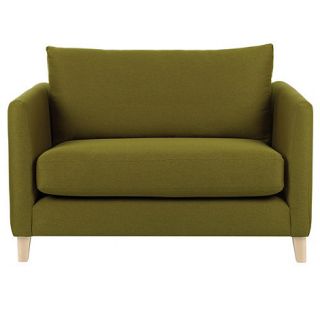 Green Dali snuggler chair with light wood feet