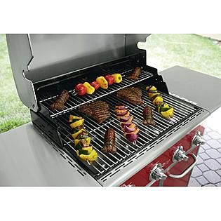 Kenmore Red 4 Burner Gas Grill With Folding Side Shelves and lit knobs