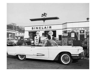 Man refueling a car at a gas station Poster Print (18 x 24)